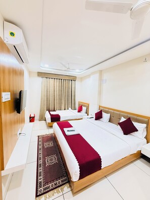 Deluxe Triple Room, City View | Iron/ironing board, free WiFi - Hotel Tirupati Inn (Ujjain)
