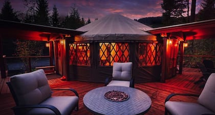 Luxurious Creekside Yurt with Stargazing Dome & Firepit near Carson, Washington