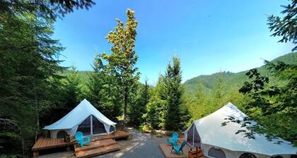 Spacious Dual Bell Tent Glamping Retreat with Forest Deck near Carson, Washington