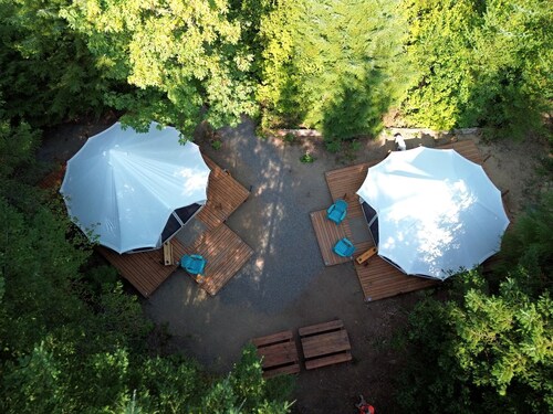 Spacious Dual Bell Tent Glamping Retreat with Forest Deck near Carson, Washington