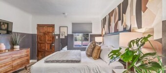 B. Abstract: Professional Design + King Bed!