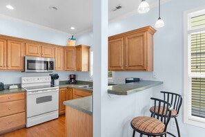 Fridge, microwave, oven, stovetop - Surfside Retreat w/ Pool & Elevator Access (Surfside Beach)