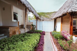 Deluxe Double Room, Pool View | Property grounds - Farashuu Luna Villa (Nungwi)