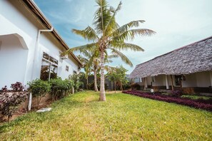 Deluxe Double Room, Pool View | Property grounds - Farashuu Luna Villa (Nungwi)