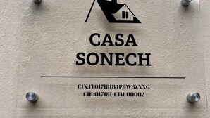 A sign with the text "CASA SONECH" and a house icon, indicating a hotel or lodging establishment. - Sonech (Sonico)