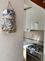 Appartamento Deluxe | Cucina privata | Frigorifero, forno, piano cottura, pentole/stoviglie/utensili