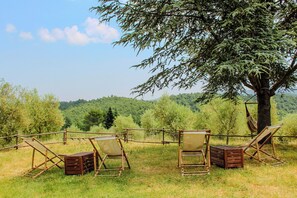 Lägenhet Deluxe | Utsikt mot trädgården