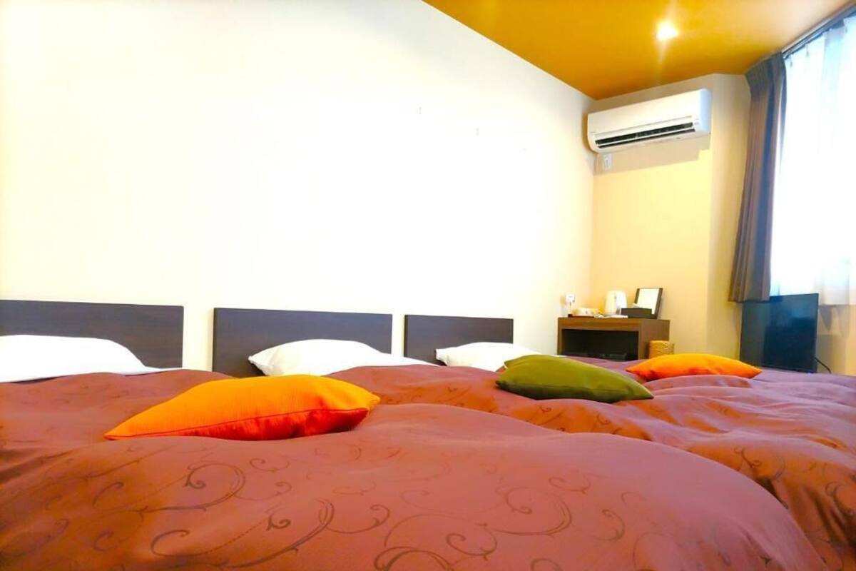 Triple Room, City View | Soundproofing, iron/ironing board, free WiFi