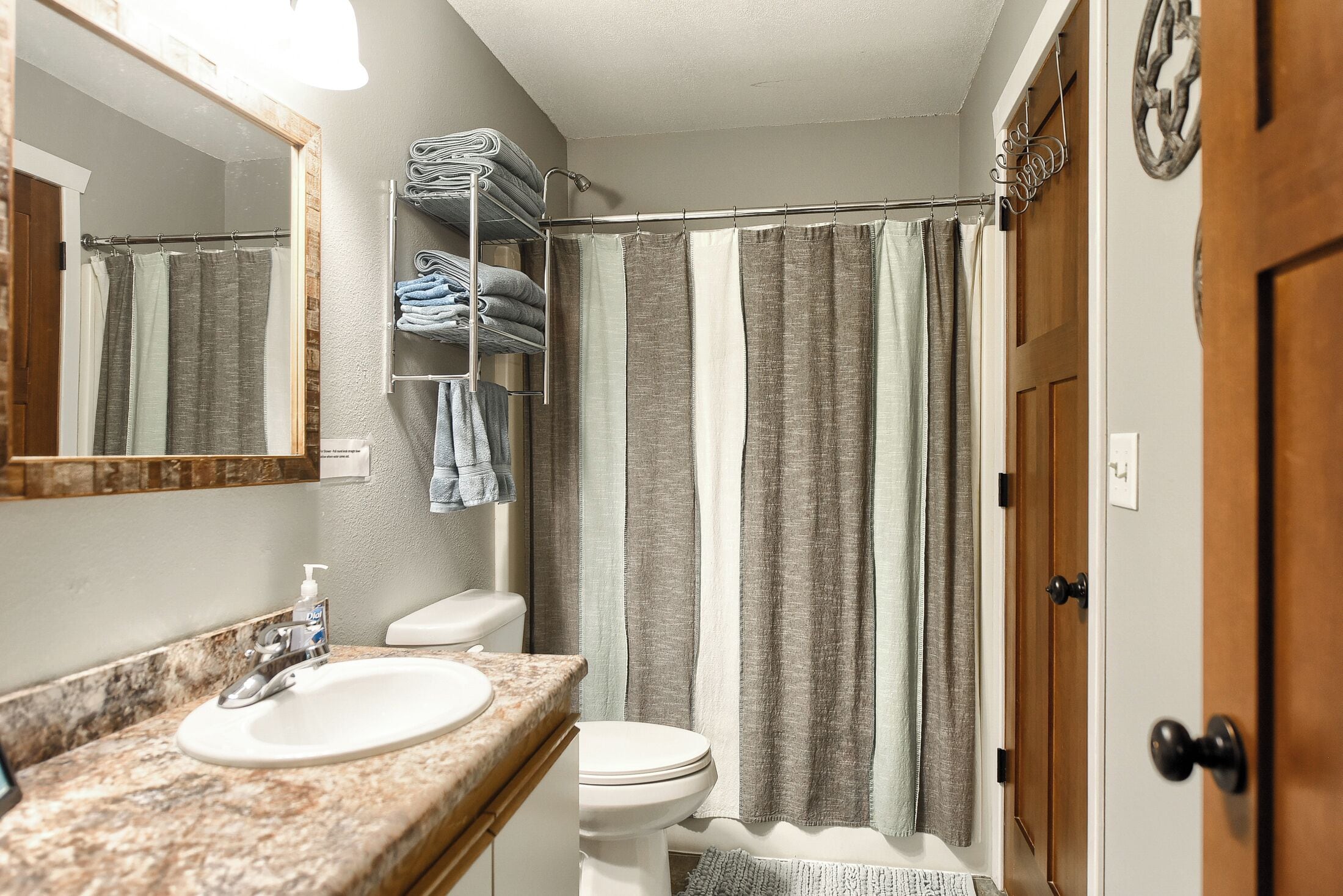 Hair dryer, towels, soap, toilet paper