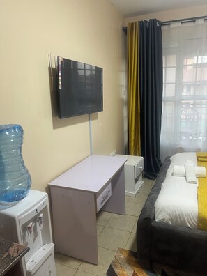 1 slaapkamer, een strijkplank/strijkijzer, wifi, beddengoed