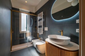 Shower, bidet, towels - GuestHost - A modern and welcoming 108 square meters apartment, perfect for five people, located on the sixth and top floor of a period building with an elevator (NOT accessible to guests with disabilities).The property is located in the elegant Prati di (Rome)