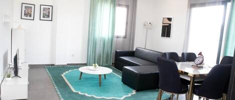 Basic Apartment | Living area | Flat-screen TV