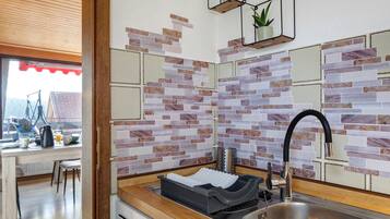 Fridge, microwave, coffee/tea maker, electric kettle