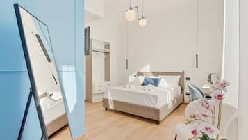 Deluxe Room, Balcony | Desk, laptop workspace, soundproofing, iron/ironing board