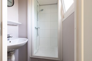 Shower, towels, soap, shampoo