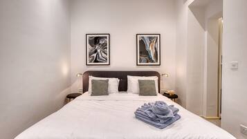 2 dormitorios, tabla de planchar con plancha, wifi gratis y ropa de cama