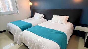 2 bedrooms, desk, iron/ironing board, travel crib