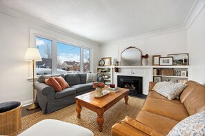 Smart TV, fireplace, books