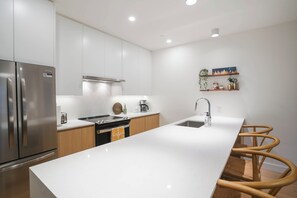 Appart'hôtel Confort, balcon, vue montagne | Cuisine privée