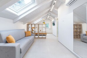 Habitació familiar | Minibar, escriptori i espai de treball apte per a portàtils 