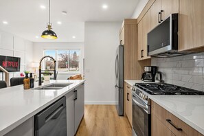 Fridge, microwave, oven, stovetop - BEST Stylish 3BR | WFH Space | 7 mins to DT (Calgary)