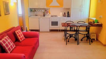 Appartement Exécutif | Cuisine privée | Grand réfrigérateur, micro-ondes, four, plaque de cuisson