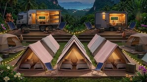 Un camping con varias tiendas de campaña, una autocaravana y vistas de la Vía Láctea.