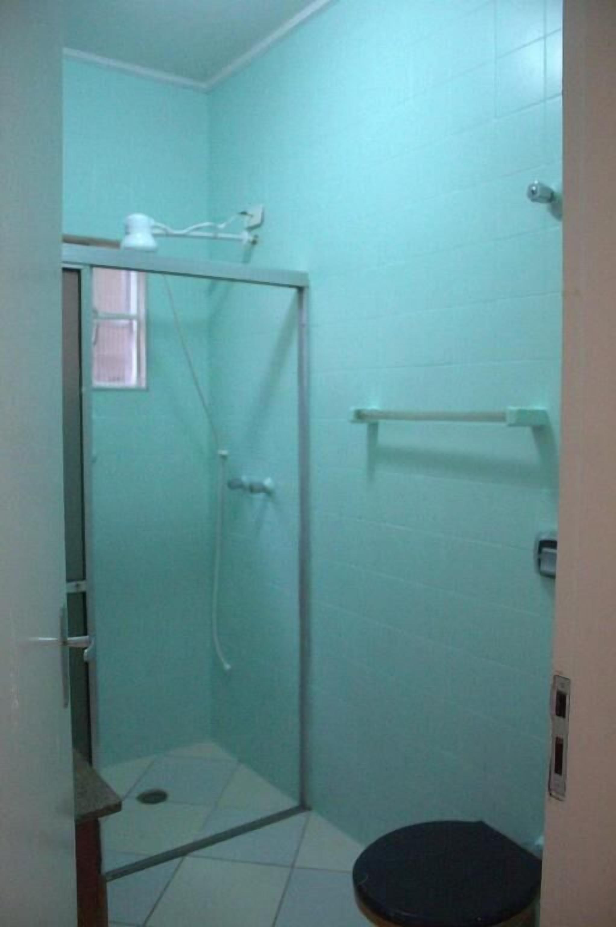 Shower, towels, toilet paper