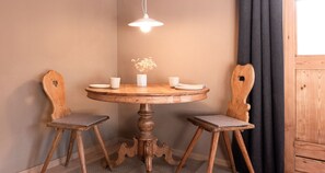 Dining - The newly renovated apartment (30 m²) has a combined living and sleeping area (Reit im Winkl)
