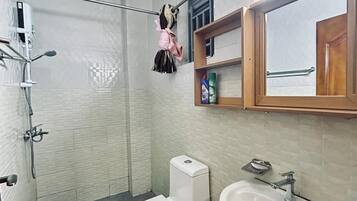 Standard Apartment, Balcony, City View | Bathroom | Free toiletries, slippers, towels, soap