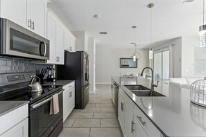 Fridge, microwave, oven, stovetop - 4BR Townhome w/ Private Pool at Storey Lake (Kissimmee)