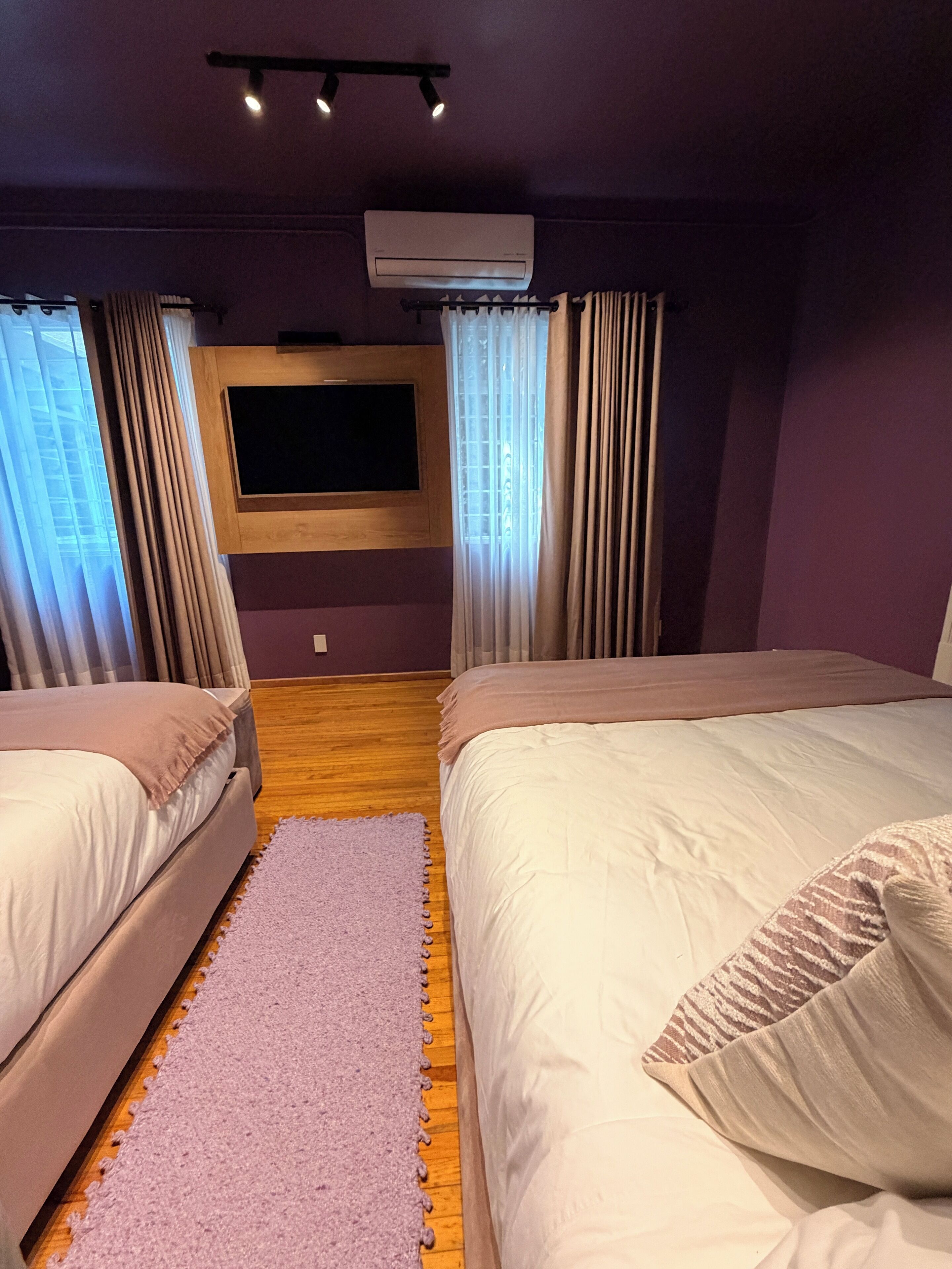 Habitación cuádruple Deluxe | Caja de seguridad en la habitación, cortinas blackout y wifi gratis 