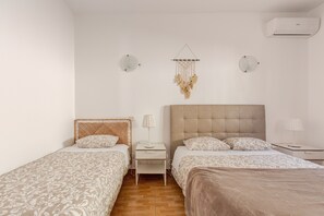 4 habitaciones, tabla de planchar con plancha, wifi y ropa de cama 