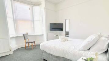 Iron/ironing board, bed sheets