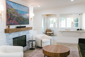 Smart TV, fireplace, books