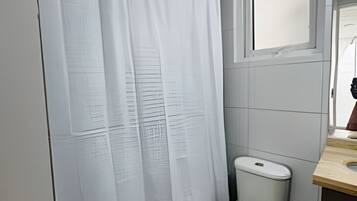 Apartment | Bathroom | Combined shower/bathtub, towels