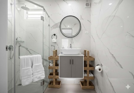 Shower, hair dryer, towels, shampoo. Bayfront | Near Casa Bacardí | Ferry to Old San Juan