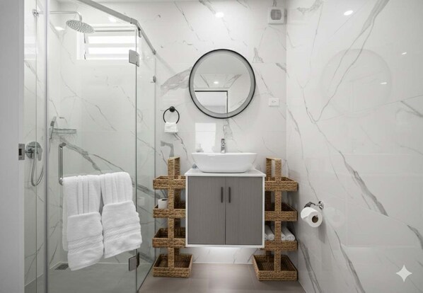 Shower, hair dryer, towels, shampoo