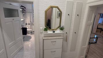 Hair dryer, towels, soap, toilet paper