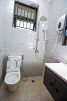 Economy Room, City View | Bathroom | Free toiletries, towels, soap, toilet paper