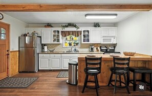 Een magnetron, een oven, een kookplaat