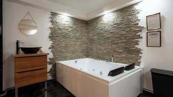 Shower, jetted tub, hair dryer, soap