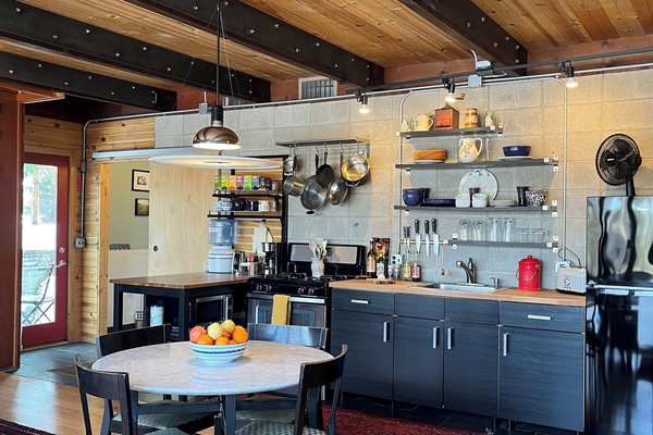 Dining table and Kitchen.