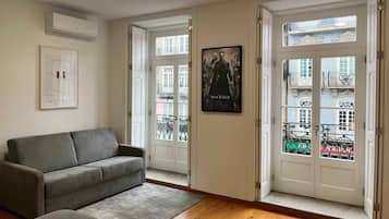 Chambre Familiale, vue ville | Coin séjour