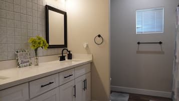 Hair dryer, towels, soap, toilet paper