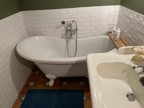 Shower, hair dryer, towels, toilet paper