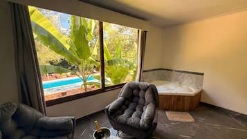 Suite Deluxe, vista a la alberca | Wifi gratis