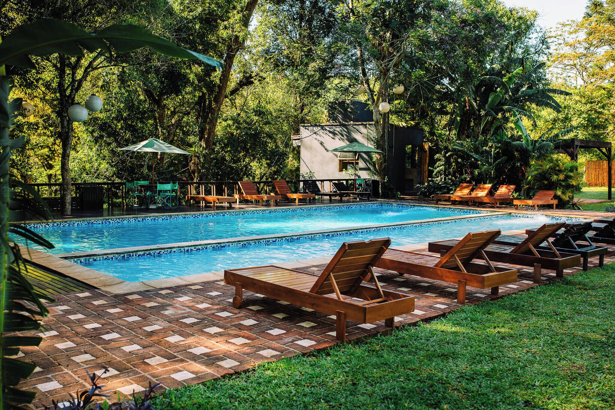 2 outdoor pools, open 9:00 AM to 8:00 PM, pool umbrellas, sun loungers