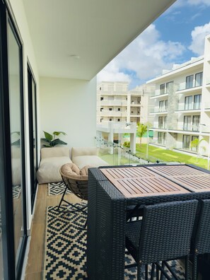 Outdoor dining - Modern Condo • Balcony + Pool View • Walk to the Beach (Punta Cana)
