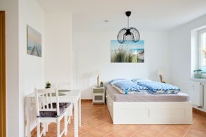 1 habitación, tabla de planchar con plancha y acceso a internet 
